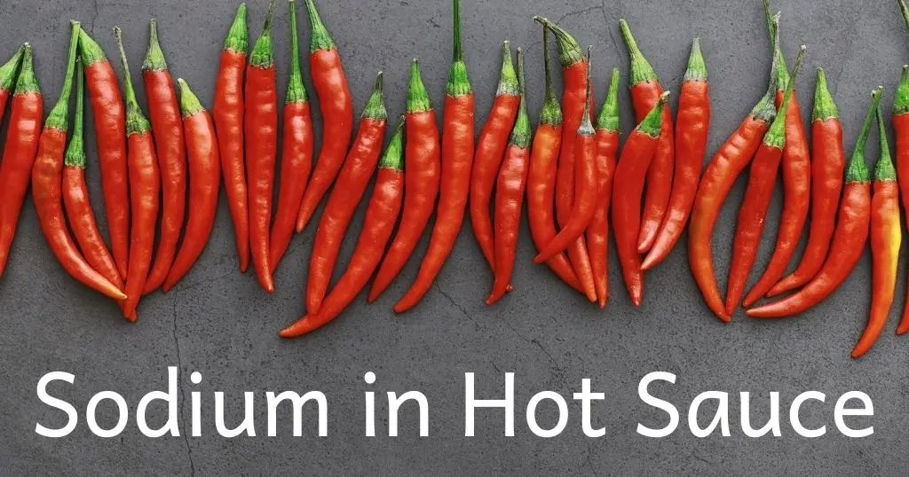 Sodium in hot sauce. Red, dried chili peppers in a row