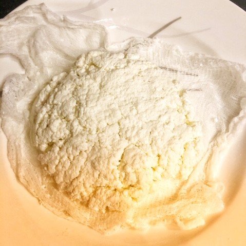 fresh paneer cheese on cheesecloth