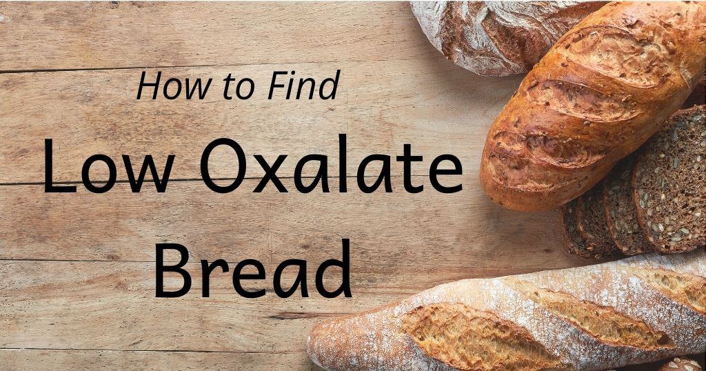 Artisan bread loaves on wood table with title: How to Find Low Oxalate Bread" over top of image