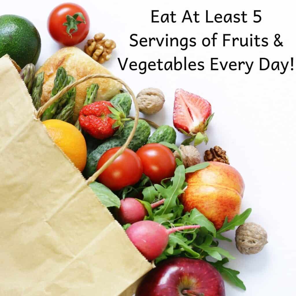Grocery bag with fresh produce spilling out of it. Text: Eat at least 5 servings of fruits & vegetables every day!
