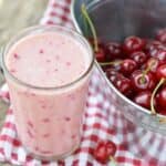 Low oxalate smoothie with bowl of fresh cherries