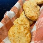 Low Sodium Biscuits on orange checkered towel in basket