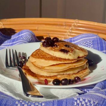 Stack of low sodium pancakes with blueberry garnish