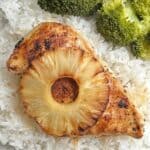 image of low sodium marinaded chicken with sliced pineapple over rice with broccoli