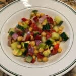 chickpea avocado salad recipe in a white bowl