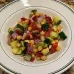 chickpea avocado salad recipe in a white bowl