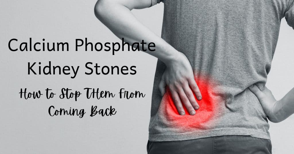 Black and white image of person holding lower back in pain with blog title: Calcium phosphate kidney stones: how to stop them from coming back over image